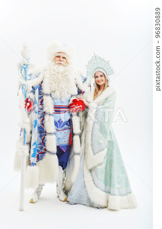 a traditional Father Frost and Snow Maiden costume on a white background. a traditional Father Frost and Snow Maiden costume on a white background. 96830889