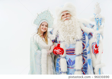 a traditional Father Frost and Snow Maiden costume on a white background. a traditional Father Frost and Snow Maiden costume on a white background. 96830890