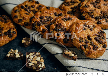 chocolate chip cookies on a dark background chocolate chip cookies on a dark background 96831180
