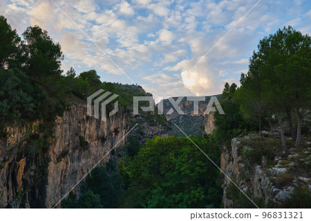 autumn forest against the backdrop of mountains autumn forest against the backdrop of mountains 96831321