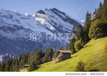 Snowcapped Bernese Swiss alps and alpine farms, Switzerland Snowcapped Bernese Swiss alps and alpine farms, Switzerland 96832082