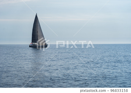 Sailing boat on blue open sea. Concept of Dream, adventure and freedom 96833158
