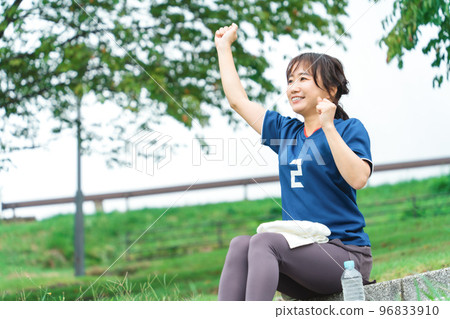 Soccer fans and supporters who win in soccer and give a guts pose 96833910