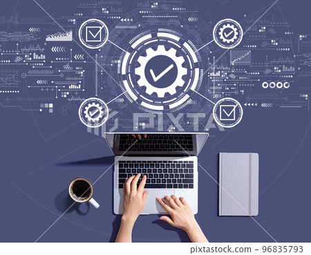 Quality control approval with person using a laptop Quality control approval with person using a laptop 96835793