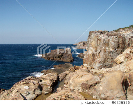 On a sunny day with a beautiful blue sea, the surf fishing point of the ground rock taken from a hill looking down (near Nanki Shirahama-cho) On a sunny day with a beautiful blue sea, the surf fishing point of the ground rock taken from a hill looking down (near Nanki Shirahama-cho) 96836556