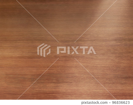 A background image of a delicate light brown wood grain desk board with light obliquely from the upper right 96836623