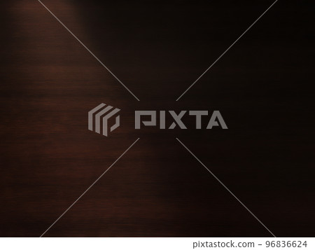 Background image of a delicate black-brown wood grain desk board with diagonal light from the upper left 96836624