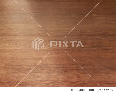 A background image of a delicate light brown wood grain desk board with light obliquely from the upper left 96836629