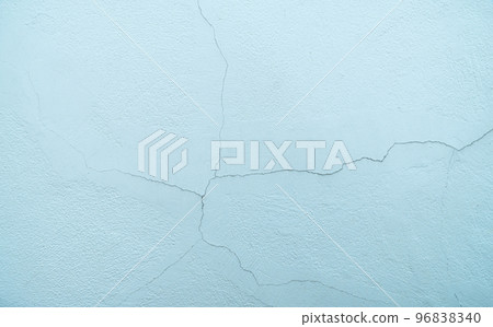 A close-up shot of a cracked wall could cause a building to collapse. Building cracks are caused by substandard construction and carelessness of the builders. cracking of building walls 96838340