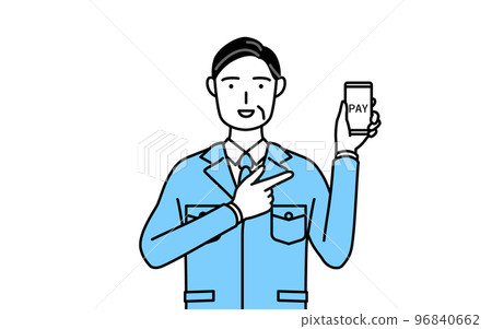 A man in work clothes recommending cashless/online payment with a smartphone (manager, manager, factory manager) 96840662