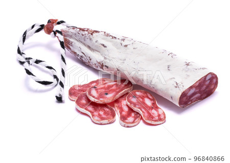 slices of Spanish Fuet thin dried salami sausage isolated on a white background slices of Spanish Fuet thin dried salami sausage isolated on a white background 96840866