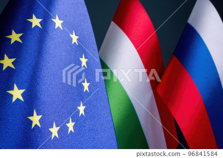 Flags of the EU, Hungary and Russia as a concept of sanctions and diplomacy. Flags of the EU, Hungary and Russia as a concept of sanctions and diplomacy. 96841584