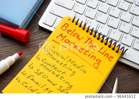 Marks about Below the line BTL marketing in the yellow notepad. Marks about Below the line BTL marketing in the yellow notepad. 96841612