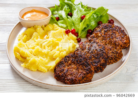fried minced liver patties with potato mash fried minced liver patties with potato mash 96842669