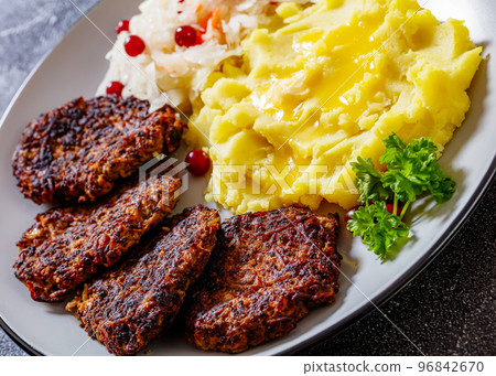 fried minced liver patties with potato mash fried minced liver patties with potato mash 96842670