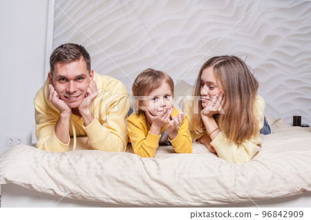 Portrait of lovely family, mom and dad with adorable child son 96842909