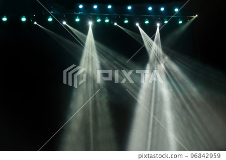 Blue and white concert stage scene show party lights on black  dark background 96842959