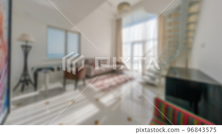 Defocused and Blured Abstract Photo of Modern Luxury Comfortable and Unique Living Room in two levels Interior Design. Perfect for background. 96843575