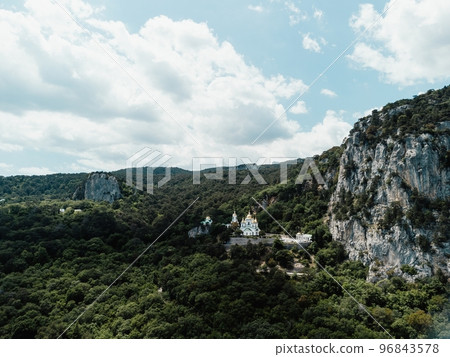 Christian church in the mountains above the sea. Temple of the Holy Archangel Michael in Oreanda. The southern coast of Crimea. Aerial view 96843578
