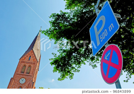 Evangelical Lutheran Church and parking sign in Warnemuende - Germany 96843899