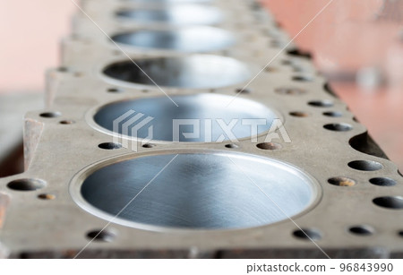 Auto mechanic working on car engine in mechanics garage. the cylinder block. Automotive part,machine part Repair service. Automotive Car repair concept 96843990