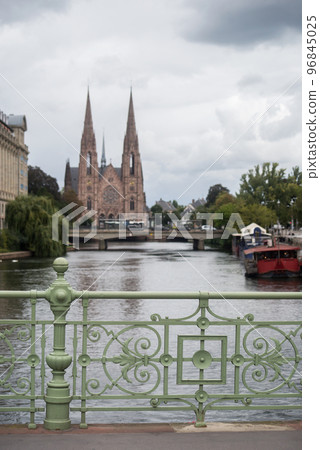 view of the famous saint paul church on il river with metallic bridge on front ground view of the famous saint paul church on il river with metallic bridge on front ground 96845025