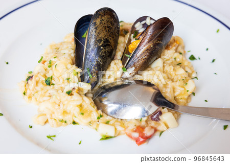 Delicious italian seafood risotto Delicious italian seafood risotto 96845643
