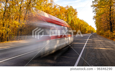 an ambulance is speeding along the highway an ambulance is speeding along the highway 96846290