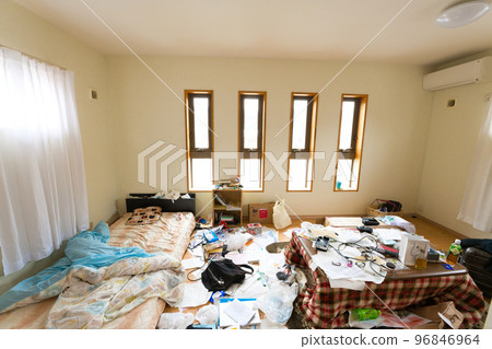 Cleaning up a messy child's room at the end of the year Cleaning up a messy child's room at the end of the year 96846964