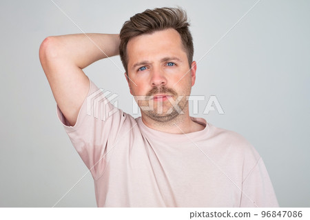 Man with hyperhidrosis sweating very badly under armpit Man with hyperhidrosis sweating very badly under armpit 96847086