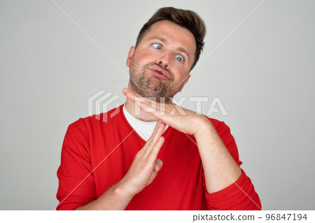 Caucasian mature man showing with hand palm arm r time out sport symbol. Caucasian mature man showing with hand palm arm r time out sport symbol. 96847194