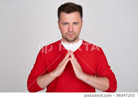 Caucasian man making house gesture meaning roof with palms Caucasian man making house gesture meaning roof with palms 96847203