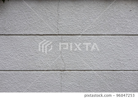 Paint on the fence of an old and cracked house Paint on the fence of an old and cracked house 96847253