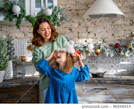 family celebrating Christmas 96848914