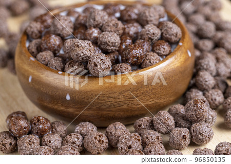 chocolate balls are used as a dry breakfast with the addition of milk or yogurt chocolate balls are used as a dry breakfast with the addition of milk or yogurt 96850135