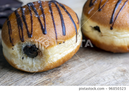 Yeast Sweet Donuts with Chocolate Filling Yeast Sweet Donuts with Chocolate Filling 96850323