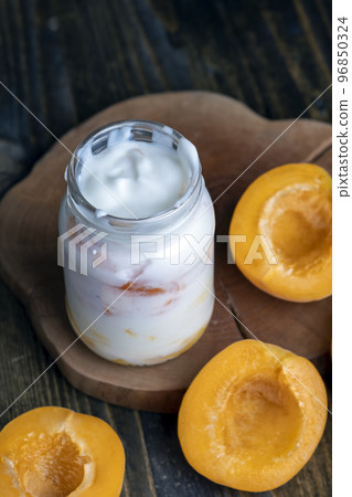 yogurt with fresh berries and apricot jam yogurt with fresh berries and apricot jam 96850324