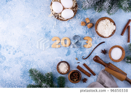 Gingerbread cookies in shape of numbers 2023. 96850338