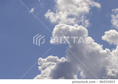 Clouds floating across the sky in the daytime Clouds floating across the sky in the daytime 96850803