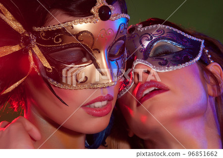 sensual women with colorful carnival mask and makeup 96851662