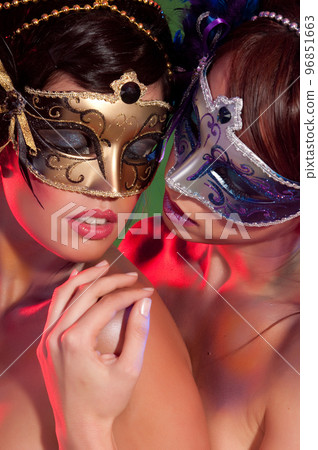 sensual women with colorful carnival mask and makeup sensual women with colorful carnival mask and makeup 96851663