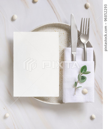 Elegant Table setting with a card decorated with eucalyptus branches top view, Wedding mockup 96852293