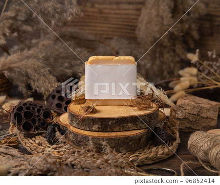 Handmade soap bar with blank label on wood near natural decorations close up. Mockup Handmade soap bar with blank label on wood near natural decorations close up. Mockup 96852414