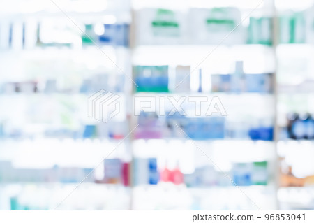 Background of blurred qualified pharmacy abstract background with drugs on shelf Background of blurred qualified pharmacy abstract background with drugs on shelf 96853041