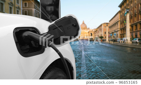 Progressive electric car recharging battery at the charging station in Vatican. Progressive electric car recharging battery at the charging station in Vatican. 96853165