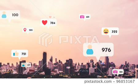 Social media icons fly over city downtown showing people reciprocity connection Social media icons fly over city downtown showing people reciprocity connection 96853167