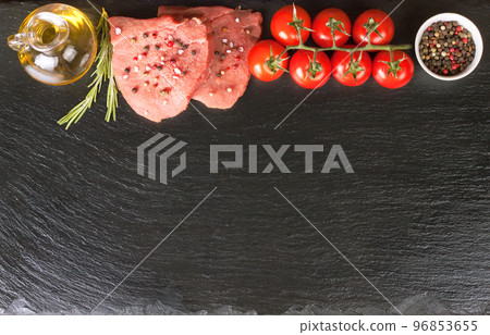 Raw steak with spices and ingredients for cooking. Flat lay. Top view. 96853655