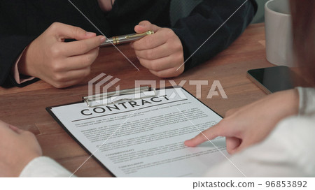 Closeup young enthusiastic businesswoman negotiate financial business contract. Closeup young enthusiastic businesswoman negotiate financial business contract. 96853892