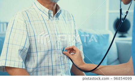 Caring young female doctor working with senior patient contented senior patient. Caring young female doctor working with senior patient contented senior patient. 96854099