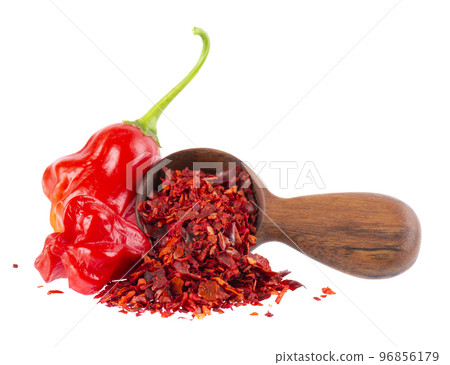 Fresh and dry ground red chili peppers isolated on white background. Capsicum baccatum or Bishop's crown pepper. 96856179